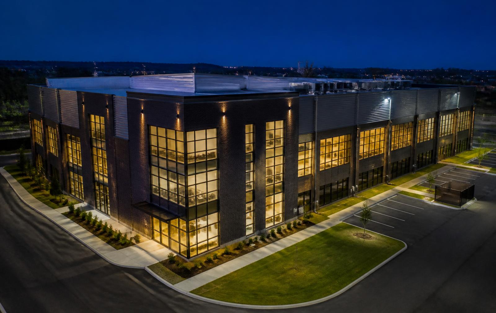 Commercial building photographed from an elevated angle at dusk, the subject of a property capture.